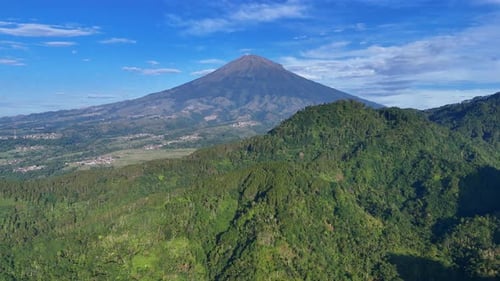 Secnic view nature landscape of forest and hills with mountain background.