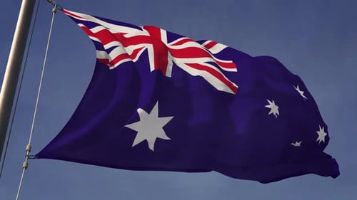 Realistic Australian Flag Waving on Pole Against Blue Sky