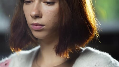Closeup of a Caucasian Woman Drinking Coffee From a Cup in a Cafe