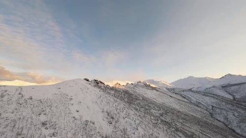 Snowy Mountain Peaks at Golden Hour