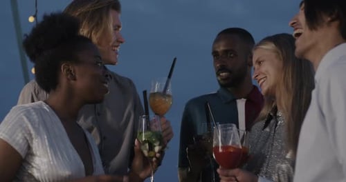 Friends Celebrating Together at Night in the City