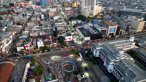 Aerial view of Jakarta Kota Train Station with Jakarta cityscape background