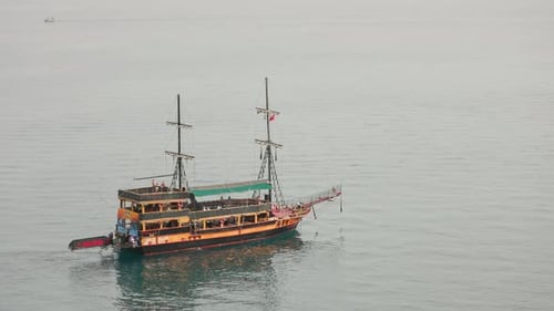 Old Ship Sails Through the Calm Sea