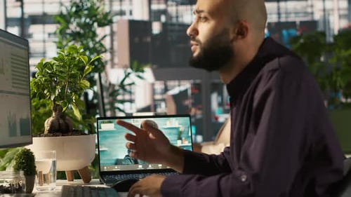 Adult Having Online Meeting in Urban Office