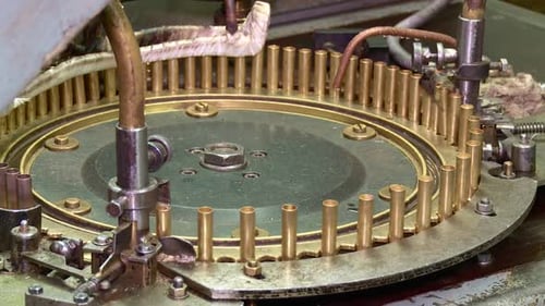 machine rotates bullet capsule