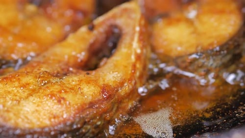 Close Up of Cooking Ilsha Fish in Deep Oil