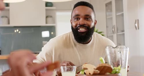 Friends and Family Enjoy Lunch Together at Home