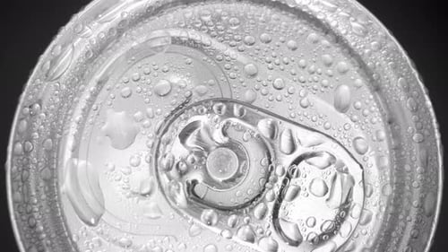 A close-up view of a beverage can's top.