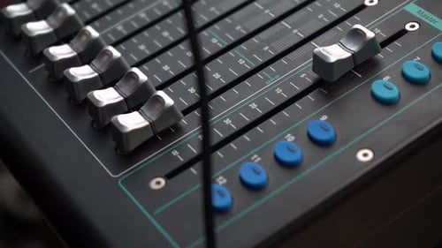 Close Up Of Channel Faders And Buttons Of A Digital Audio Mixer.