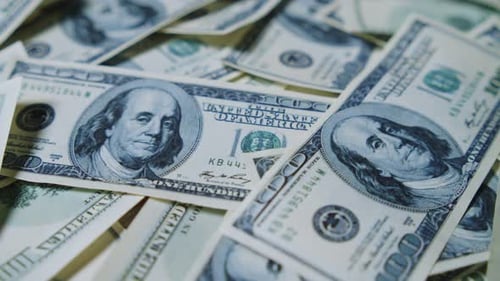 Pile of One Hundred Dollar Bills