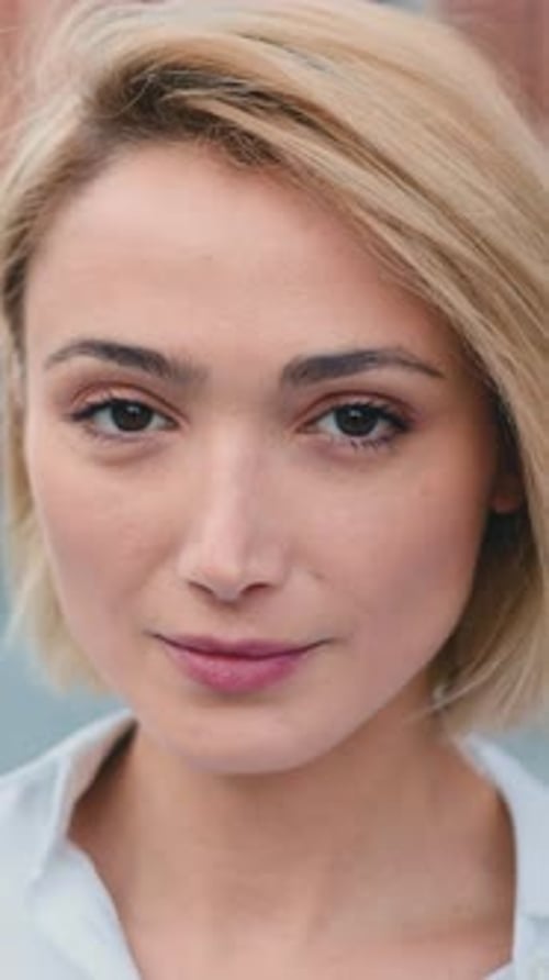 Portrait Face of Beautiful Caucasian Blonde Woman Smiling in Urban City Outdoors Slow Motion