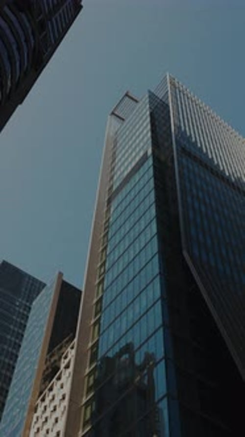 Office Buildings with Mirror Glass Facades in Downtown Business City