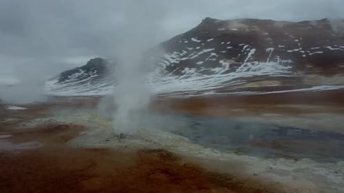 Namafjall Hverir geothermal area in Iceland. Stunning landscape of sulfur valley with smoking