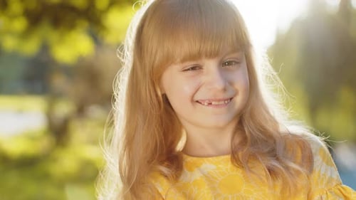 Portrait of Happy Preteen Child Girl Face Smiling Looking at Camera Good Mood Satisfied on Park
