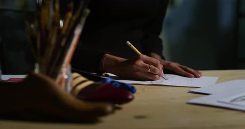 Shoe Designer Sketches Artful Shoe Design