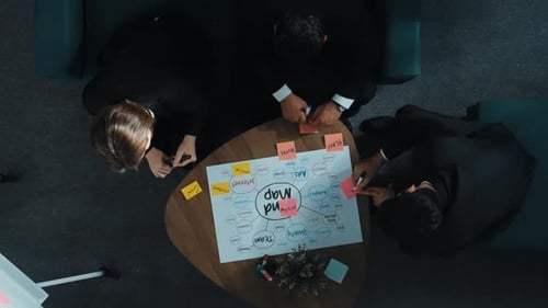 Business Team Brainstorming Marketing Ideas at Office Workplace