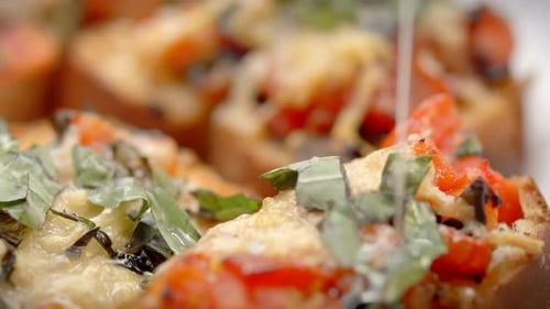 close up toasted bread brochetas with tomatoes, garlic, onion, Mediterranean diet, carbs