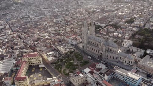 Drone shot of the historic center of Quito, Ecuador with La Basilica del Voto Nacional during quaran