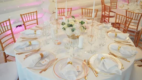 Elegant Wedding Table Setting with Gold Details
