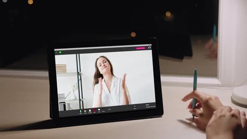 Woman on a Video Call Late at Night