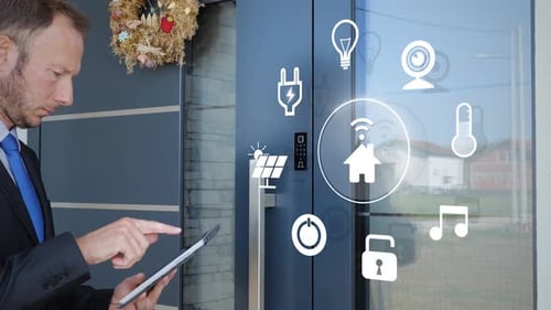 Adult Controls Smart Home with Tablet Technology