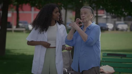 Compassionate Care A Heartwarming Moment in the Beautiful Park Enjoying Nature