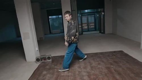 Young Man Breakdancing in an Urban Setting