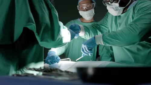 Surgeons Perform Operation in Brightly Lit Operating Room