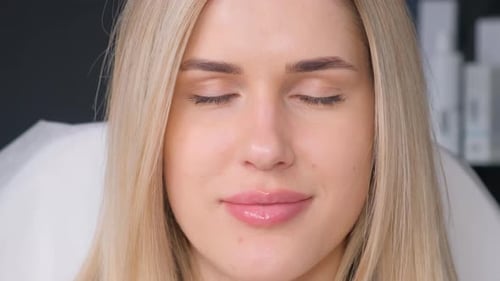Attractive Woman Smiles Brightly in Close Up Shot