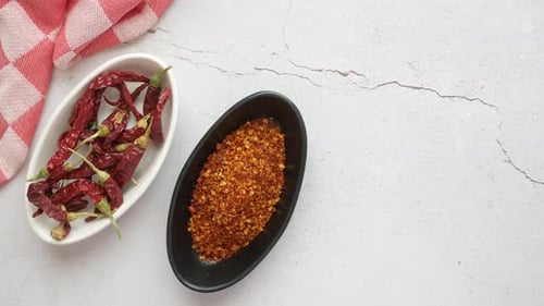 Chili Flakes in a Bowl on Table