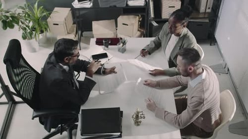 Top View of Jurist Making up Sales Contract to Diverse Customers