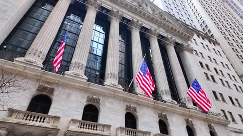 New York Stock Exchange Facade with American Flags