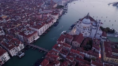 Aerial view of grand canal and church at sunrise, Italy.
