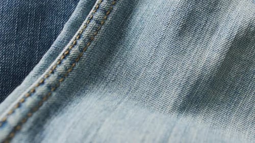 Close up of jeans with different shades with copy space