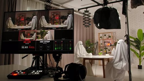 Two Funny Ghosts Record a Podcast in a Studio