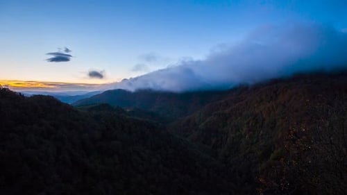 Time lapse scene of autumn sunrise in Puigsacalm peak, La Garrotxa, Spain