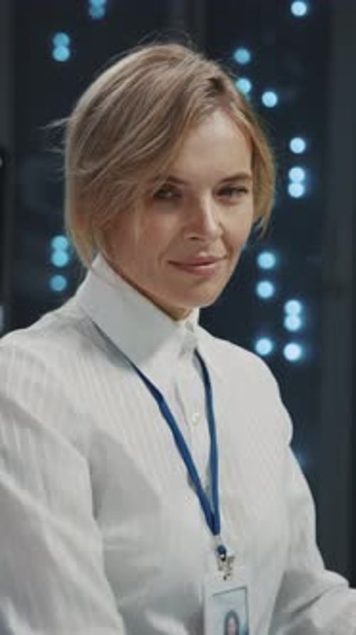 Young IT Financial Worker Manager Administrator Woman in Server Office Room Data Center Specialist