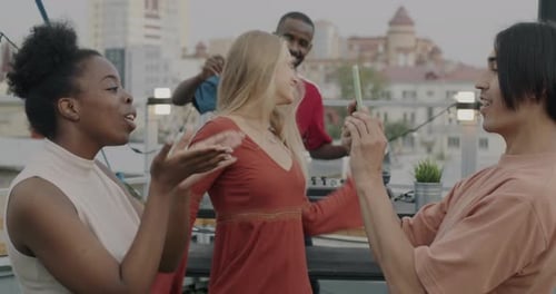 Diverse Friends Enjoying a Rooftop Party