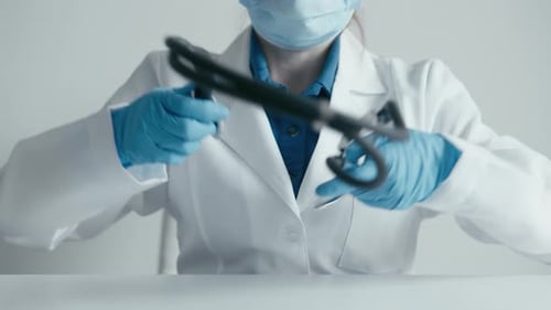 Doctor with Stethoscope Preparing for Patient Appointment