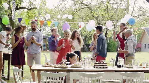 Family Celebration or a Garden Party Outside in the Backyard
