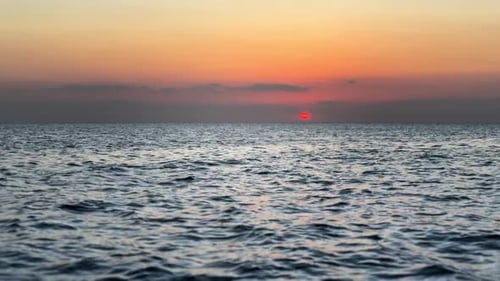 Horizon, waves and sky at beach with sunset for travel location, tropical island