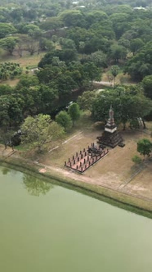 View From the Sky of a Monument Next to a Water Reservoir