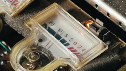 Retro Sound Level Meter Decibel Meter in Studio Vintage Audio Equipment Close Up Magnetic Tape Music
