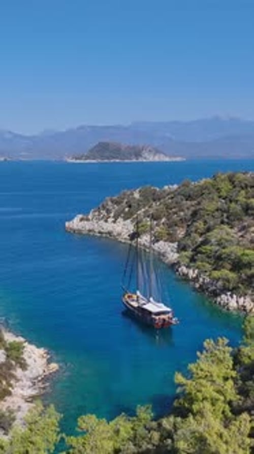 Drone view of gulet on calm waters