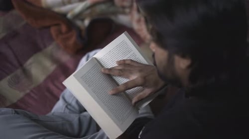 Young Adult Reading Book Indoors