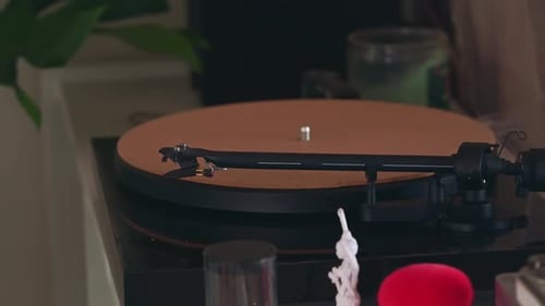 Placing Vinyl Record onto a Turntable