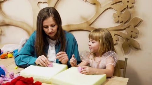 Crafting Soft Toys with a Child at a Creative Workshop in Autumn