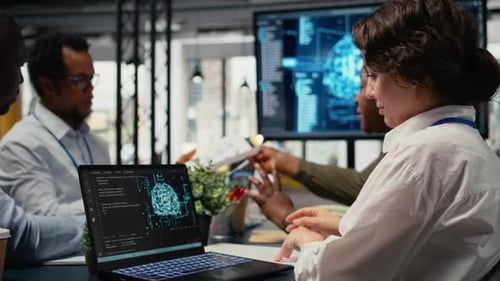 Software Developers in Startup Office Brainstorming Leveraging AI Tech