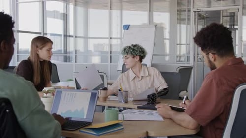 Team Meeting in a Bright Modern Office