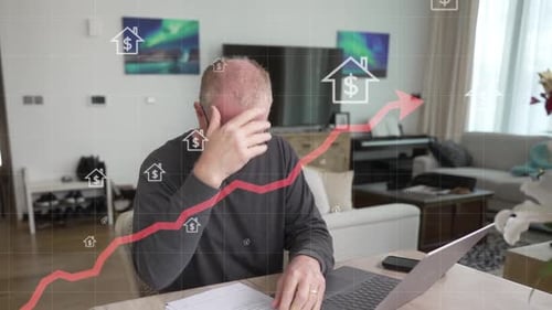 A senior man frustrated by climbing housing and real estate costs, loan rates, and inflation